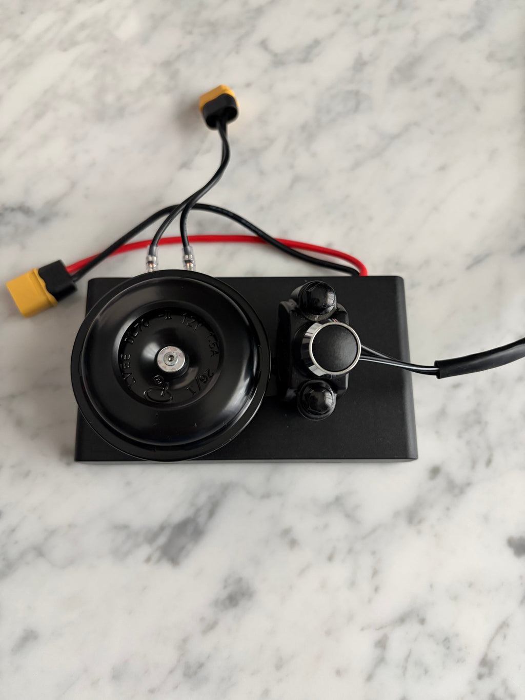 Battery powered horn [comes with a switch] can fit any bike